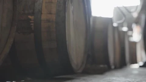 Whiskey Bourbon Barrels Being Dumped and Poured  Stock Footage 240028211