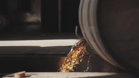 Whiskey Bourbon Barrels Being Dumped and Poured  Stock Footage 240028212