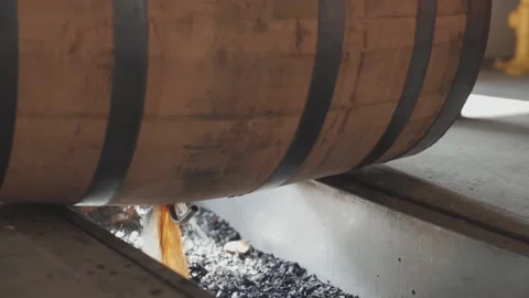 Whiskey Bourbon Barrels Being Dumped and Poured  Stock Footage 240028219