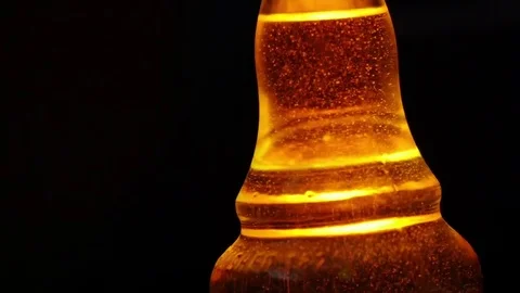 Whiskey bubbles slow motion Stock Footage 69122381