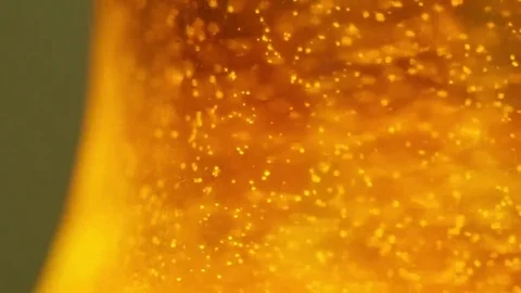 Whiskey bubbles slow motion Stock Footage 69122401
