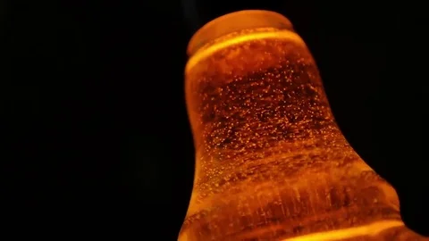 Whiskey bubbles slow motion Stock Footage 69122425