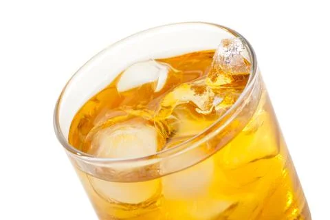 Whiskey with ice cubes. Isolated on white Stock Photos