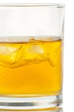 Whiskey with ice cubes. Isolated on white Foto stock