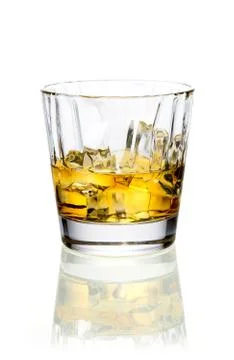 Whiskey or brandy on ice Stock Photos