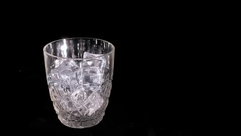 Whiskey poured into a glass Stock Footage 105752272