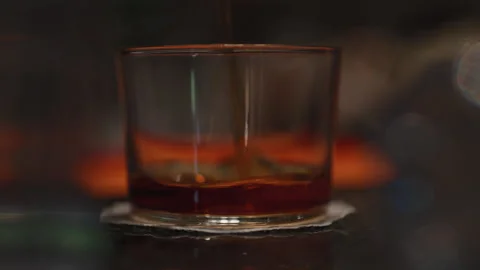 Whiskey Poured Into Glass Stock Footage 254163419
