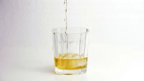 Whiskey on the rocks on white background Stock Footage 95047213