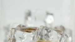 https://images.pond5.com/whiskey-soda-poured-glass-large-footage-122375282_iconm.jpeg