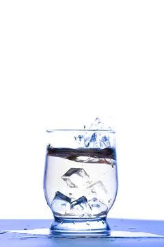 Whiskey with splashes in a glass Stock Photos