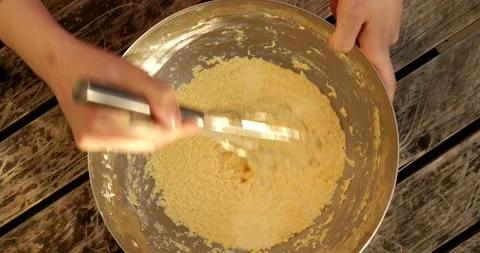 Whisking cake mix by hand Video stock 130794651