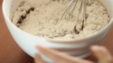 Whisking chocolate with flour Stock Footage 24012205