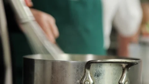 Whisking cream on a pot Video stock 88810538