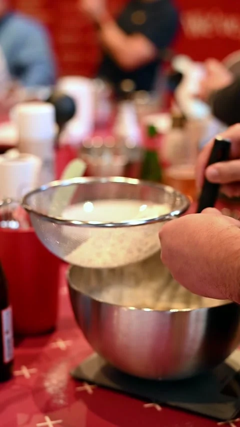 Whisking Dough. Adding Flour to Dough. Baking Preparation Stock Footage 304705245