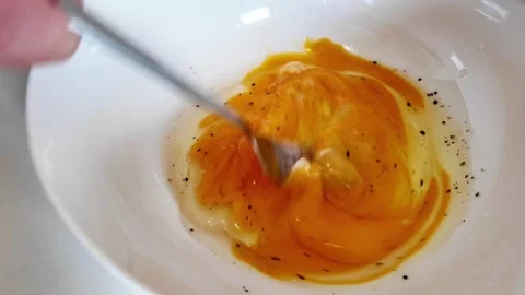 Whisking Eggs and Pepper for Healthy Breakfast Stock Footage 274904063