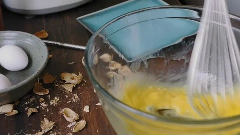 Whisking eggs in a bowl	 Stock Footage 75759540