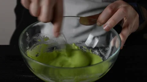 Whisking with a fork a cake batter Stock Footage 153894761