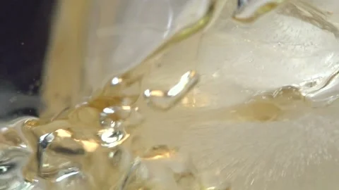 Whisky Pour over Ice Stock Footage 157612652