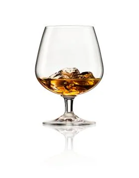 Whisky on the rocks. White background with reflection. Stock Photos