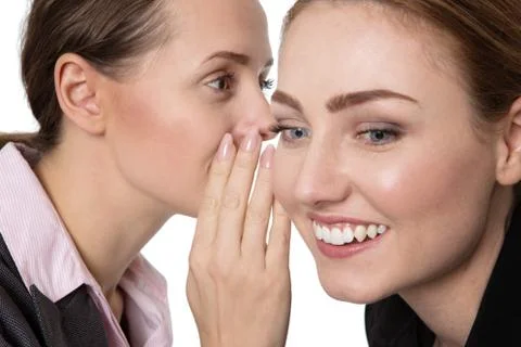 Whispering co-workers Stock Photos