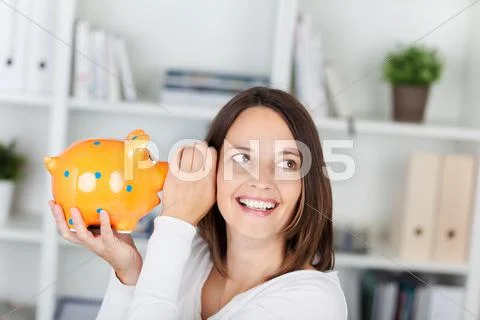 Whispering piggybank Stock Photos