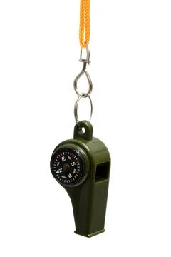 Whistle with a compass Stock Photos