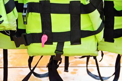 Whistle at life jacket Stock Photos