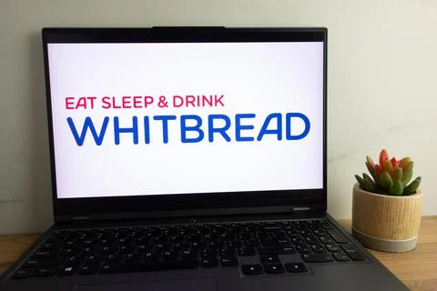Whitbread plc multinational British company logo on laptop Stock Photos