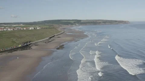 Whitby drone flying about the beach towards Sandsend Stock Footage 240641452