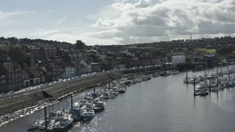 Whitby drone shot over River Esk approaching shipyard Stock Footage 239094400