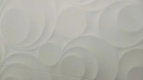 White 3D wall panel texture background with abstract circle pattern Foto stock