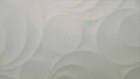 White 3D wall panel texture background with abstract circle pattern Foto stock