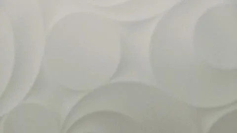 White 3D wall panel texture background with abstract circle pattern Foto stock