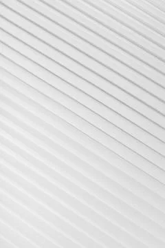 White abstract background of diagonal parallel lines pattern with gradient li Stock Photos