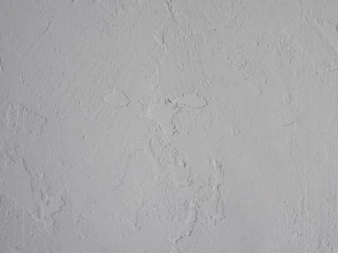 White abstract background or texture of concrete wall with rough stucco Stock Photos