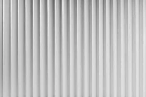 White abstract background of vertical parallel stripes pattern with gradient  Foto stock