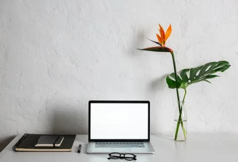 White abstract desk with empty notebook screen Stock Photos
