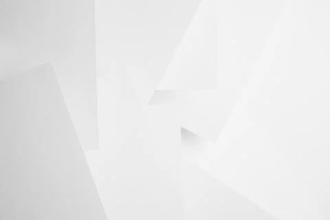 White abstract geometric background with soft light paper surfaces fly as ran Stock Photos