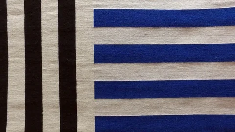White abstract knitted background. Black and blue strip. Stock Footage 79195598
