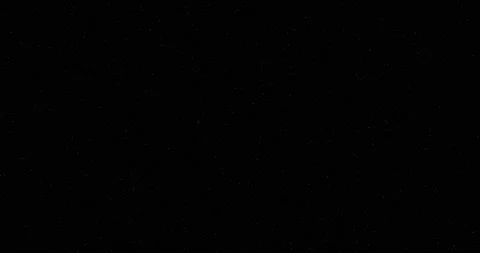White abstract snow, large rain falling down in the wind on a black background. Stock Footage 164070894