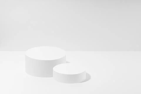 White abstract stage mockup with two white round podiums for cosmetic product Stock Illustration