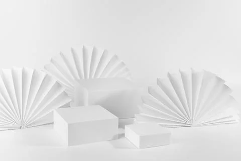 White abstract stage with set of three podiums mockup for presentation of cos Stock Photos