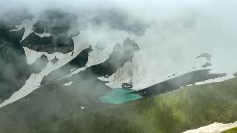 White Abudelauri Lake emerges between drifting clouds 库存影片 340388863