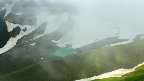 White Abudelauri Lake emerges through dense fog Stock-Footage 340388790