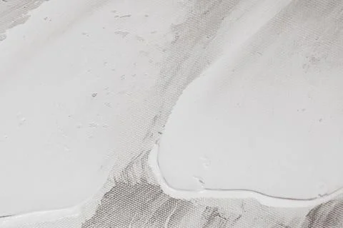 White acrylic paint stroke texture on canvas fabric close up detailed artis.. Stock Photos