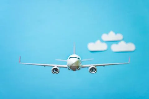 White airplane on a blue Stock Photos