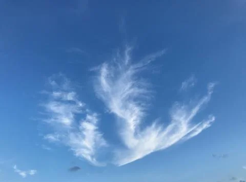 White amazing shape clouds look like flame with bright blue sky Stock Photos