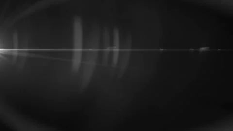 White anamorphic lens flare with ghosting overlay Stock Footage 319462095