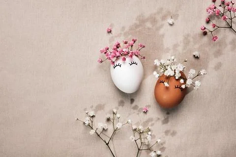 White and black Easter eggs with natural flowers decor. Zero Waste Easter Stock Photos