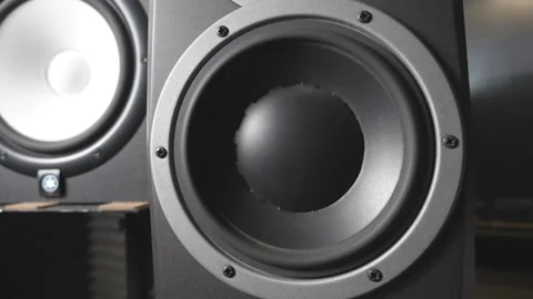 White and black speaker pulsating and vibrating from sound on low frequency Video stock 102710900